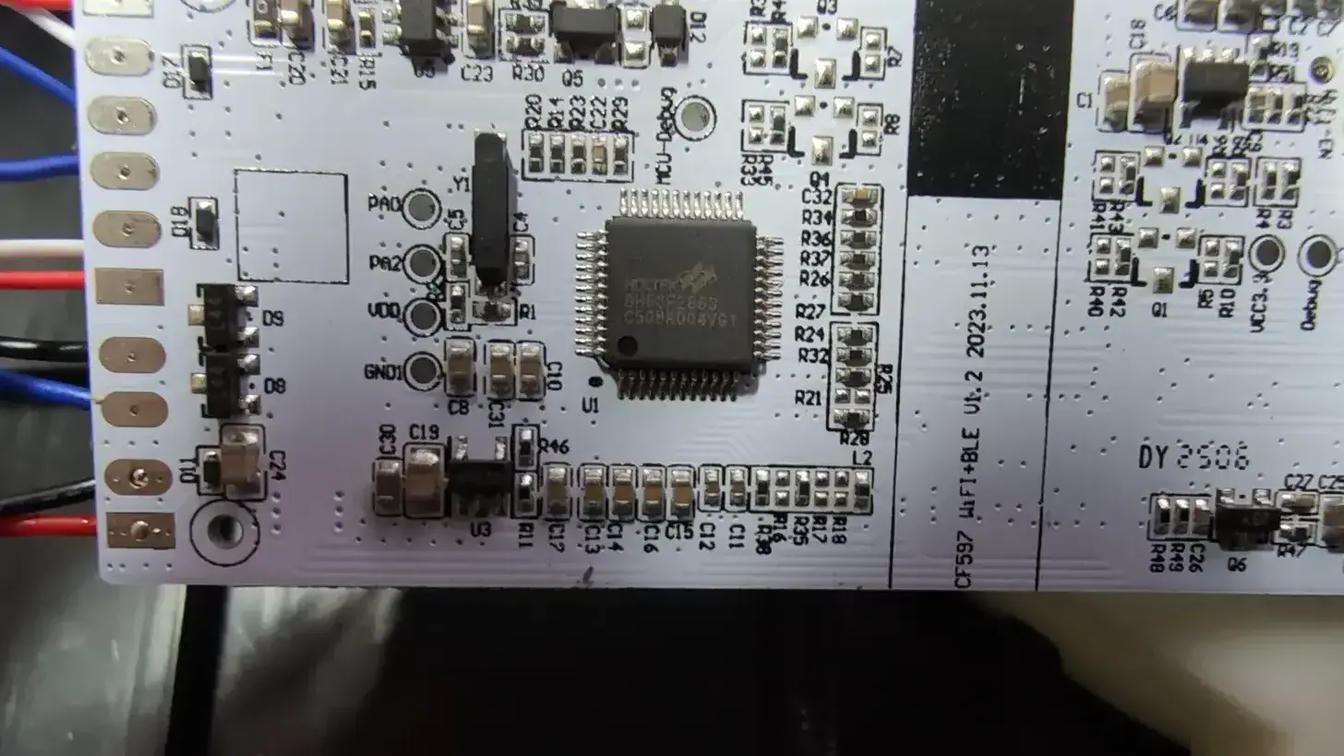 The Hume Pod main PCB showing the LEFU ESP32-C2 module on the left and the Holtek BH66F2663 main MCU in the center.